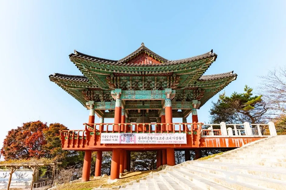 The wooden bell pavilion at Seokguram, reached by a flight of stone steps