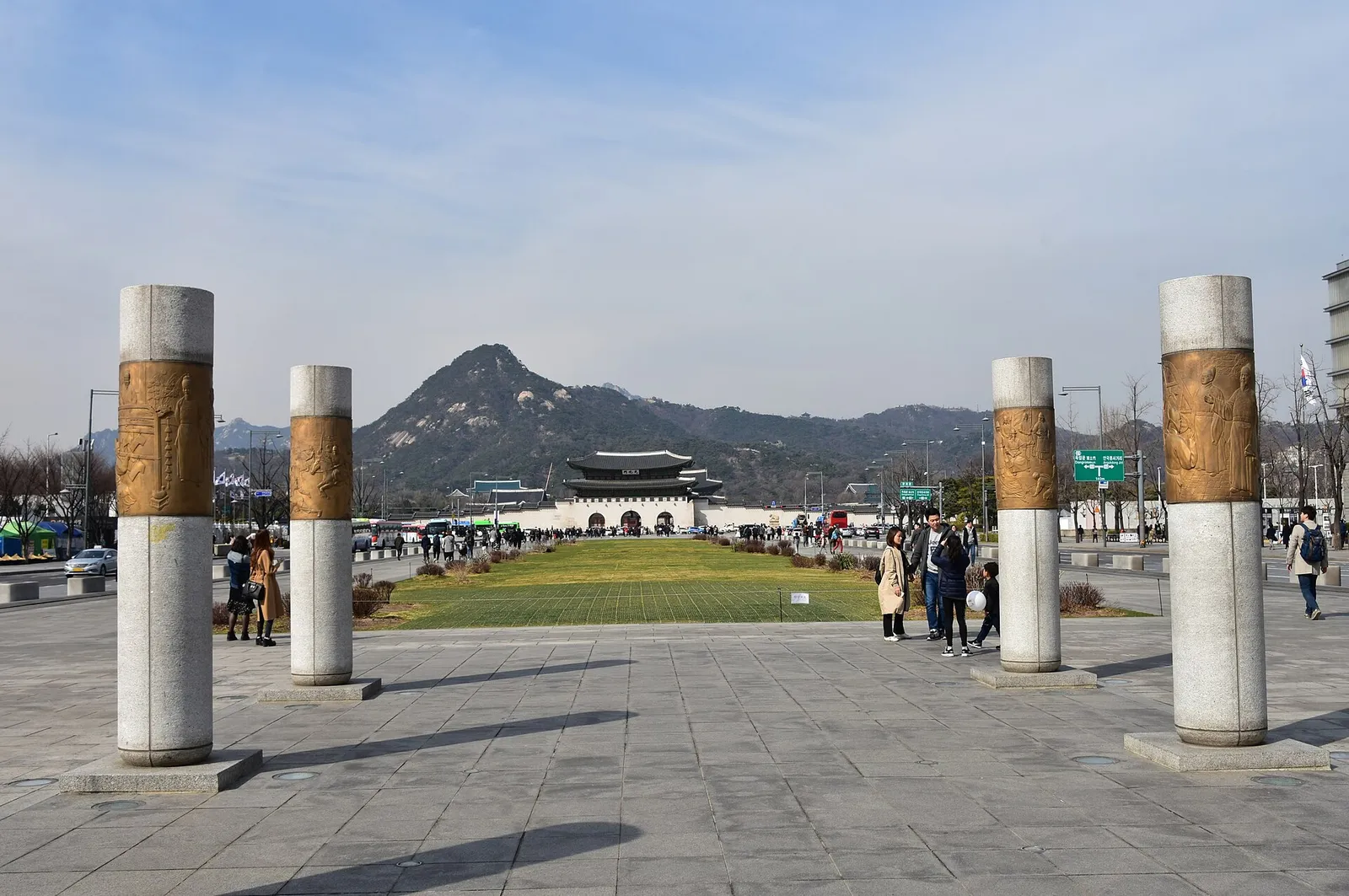 Gwanghwamun Square with the palace gate and mountains behind