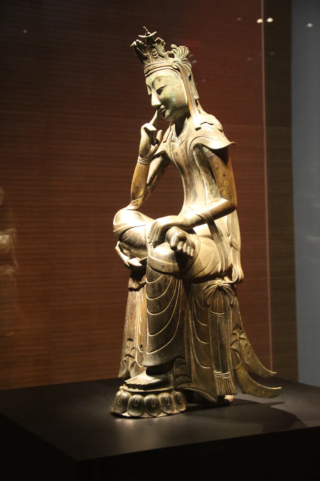 A gilt-bronze Pensive Bodhisattva in the Room of Quiet Contemplation